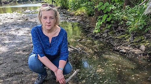 Lisa Smart looking concerned at the Goyt river bed