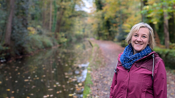 Lisa Smart MP stood by a canal in Marple