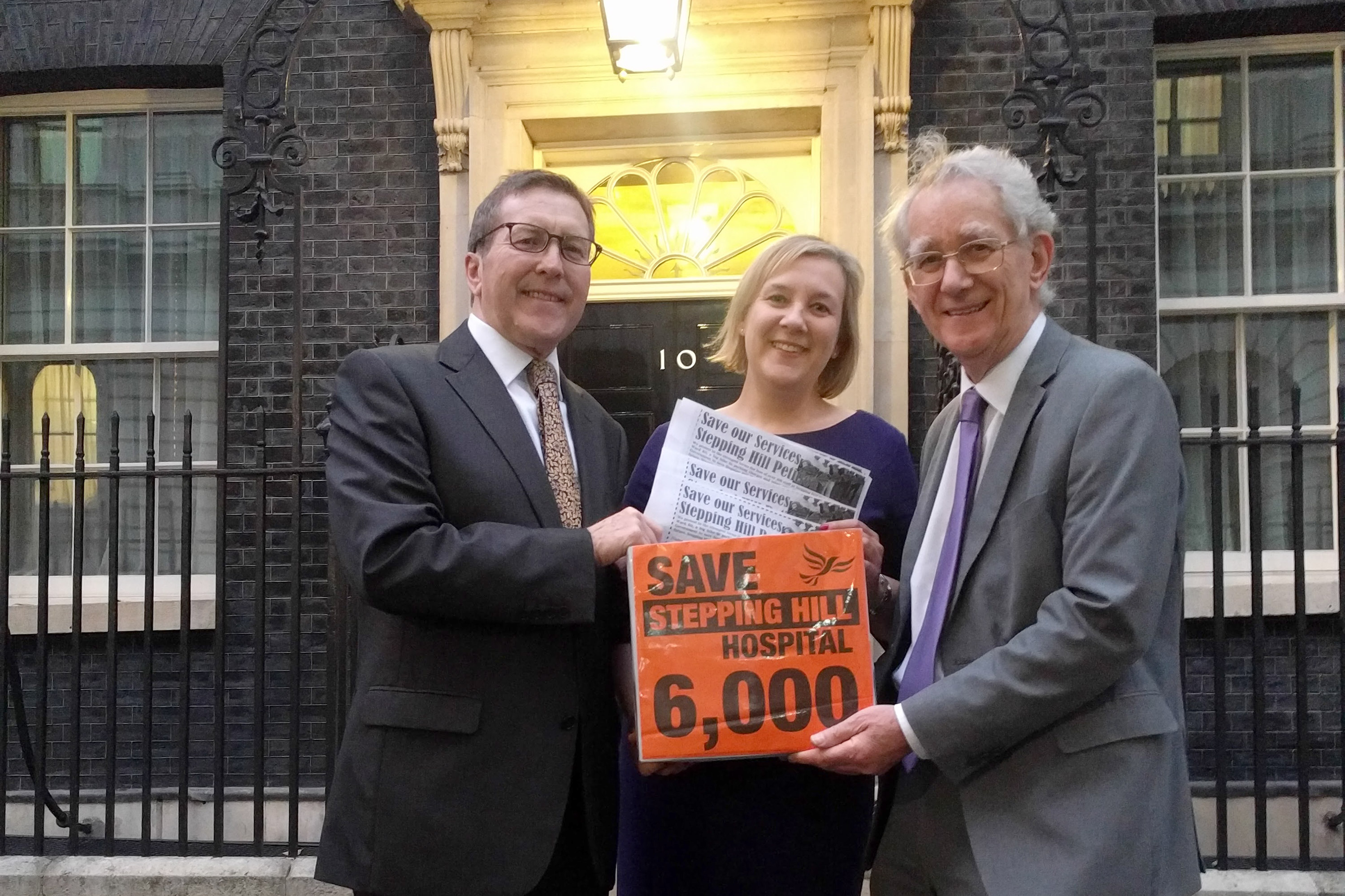 Mark Hunter, Lisa Smart and Andrew Stunell present the petition to Downing Street